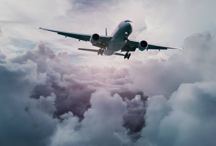 69682126_Airplane-in-the-sky.jpg