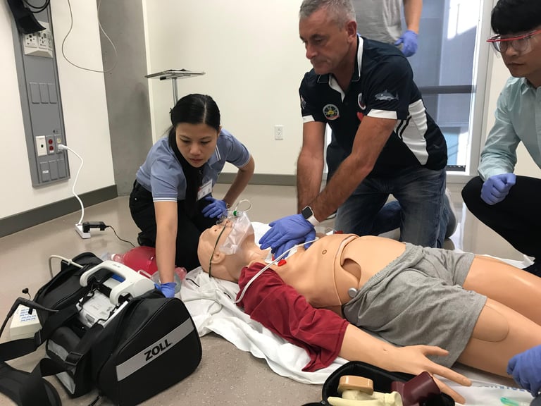 Students at CPRU practice a CPR scenario