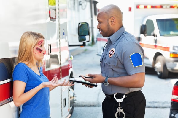 Paramedic speaking to patient