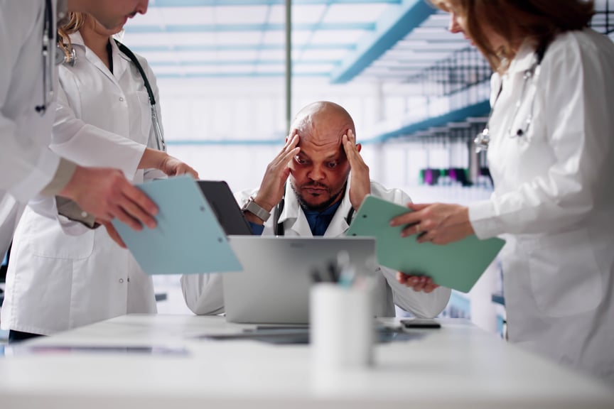 Medical personnel with a headache