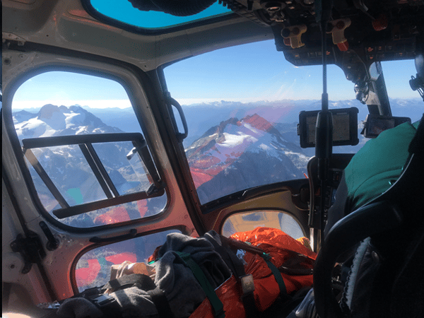 helicopter rescue team above the snow mountain