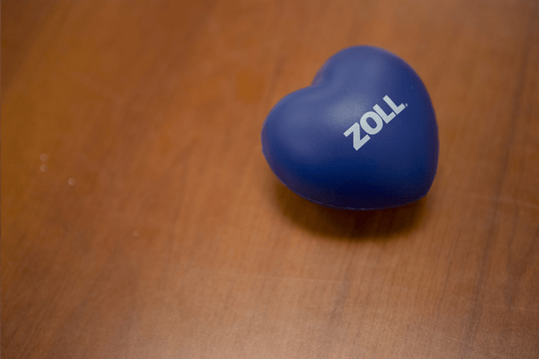 ZOLL Data heart shape ball on a wooden table