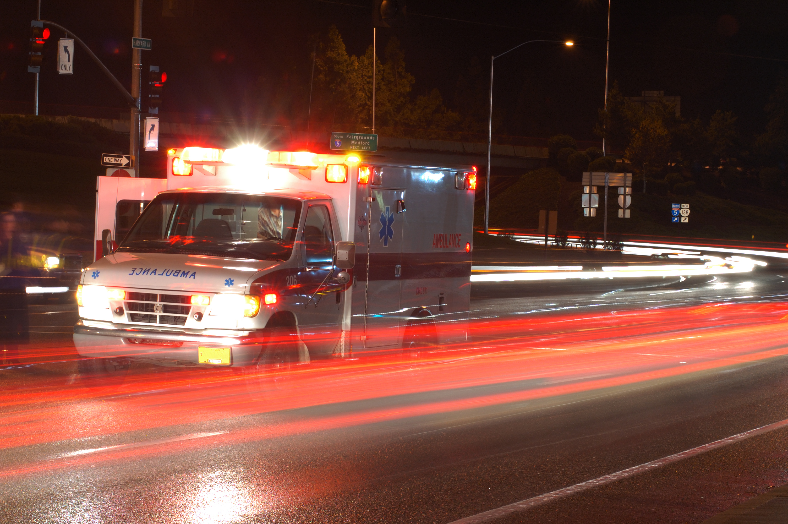 speeding ambulance at night
